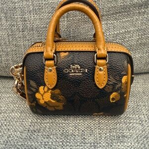 SOLD- Coach Rowan Bag Charm- Dark Signature Floral